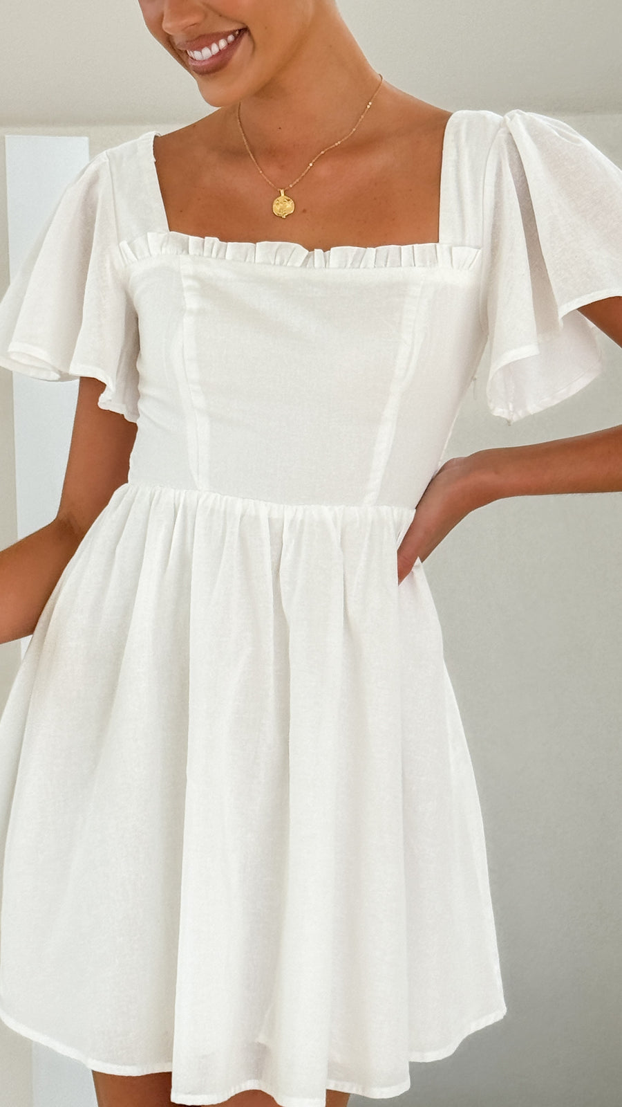 White Linen Mini Dress – Flutter Sleeve A-Line Fit for Summer Days-3